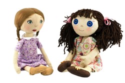 Two rag dolls isolated on white