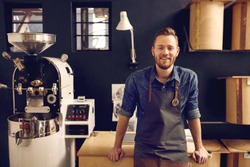 Entrepreneur in his modern coffee roastrery and distribution spa