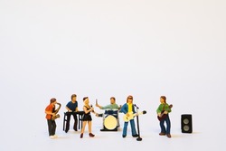 miniature music band on white background