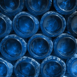 View of classic blue color stacked bottles bottom - Classic blue the color of 2020 