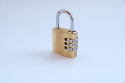 Close up, golden padlock with password,pass code on white background. There is no need key to use this padlock