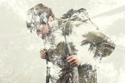 Double exposure hiker into the forest