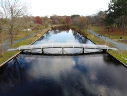 Aerial drone view of Salisbury city park bridge and lake Salisbury Maryland Fall 2020
