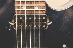 Dusty old seven string guitar