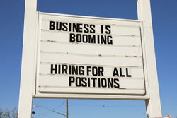Business is booming sign in Austin, Texas market