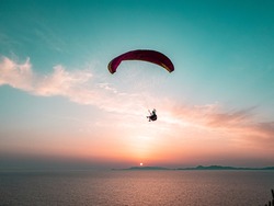 Paragliding with amazing sunset view