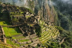 Wonder of the World Machu Picchu in Peru. Beautiful landscape in Andes Mountains with Incan sacred city ruins. 