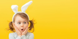 Seasonal sale and discount. Shopping and retail. Preparing for Easter holiday. Promoting goods. Funny, surprise, little child girl in bunny ears. Banner, copy space for text, mock up
