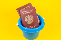 Russian passport with the inscription: Russian Federation. Passport in a bucket.