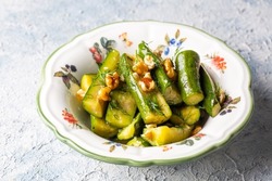 Green zucchini salad with walnuts and dill, Turkish appetizer - meze