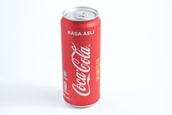 Kuching,Malaysia. 13 March 2021. A cold Malaysian version Coca - Cola can with malay lettering translated to 