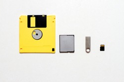 Various types of data storage. Flash drives, memory card and floppy disk