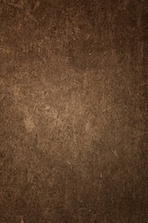 Old brown cement plaster as a background.