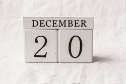 Save the date. December 20th. Day 20 of month, date calendar on white background.  White block calendar present date 20 and month December, Advent, special occasions, website events. 