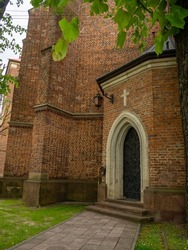 The door in The Roman Catholic church of St. Bartholomew, Drohobych, Ukraine. Medieval iron door of Church 15-16th Century, gothic, baroque architecture.