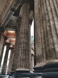 eautiful light colonnade of the Corinthian order made of Pudost stone of the famous Kazan Cathedral in the style of the Russian Empire in St. Petersburg.  Architecture of Russian cities.     