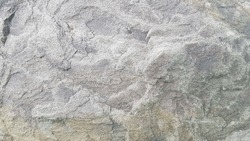 grey rock texture background. grunge texture. boulder texture.