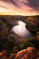 The view over a gorge with it's river in the Nitmiluk Nationalpar in Northern Territory, Australia, at sunset. 