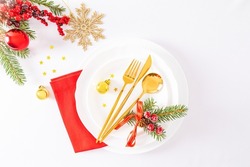 top view of the winter festive table with serving in the classic style of celebrating the New Year. Christmas decorations . background layout