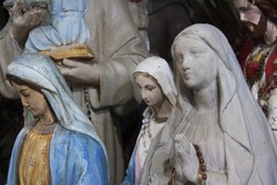 Religious statuettes. Portrait sculpture of Mary and Jesus. Ancient artefacts. Christianity