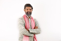 Portrait of an happy Indian bearded man in rural India concept. Funky expressions white background. 