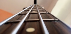 close up bass guitar fret