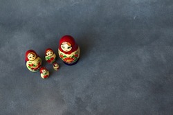 mamushka or matrioshka family looking up. with a gray background, the whole family of dolls together. Unit
