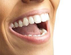Close Up Of Smiling Teeth Isolated On White Background