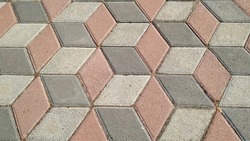photo of red green grey diamond shape tile pattern in the park, good for background