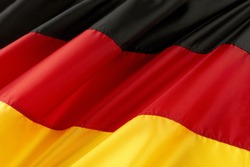 Close up shot of colorful, wavy German flag