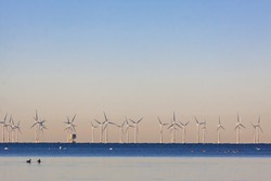 An offshore wind power station in Oresund between Denmark and Sweden when the first cold winter day in the end of November