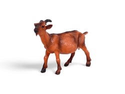 Brown goat animal plastic toy isolated on white