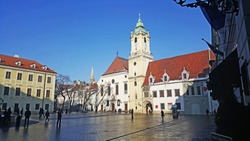 Old building of bratislava city museum with tower and blue sky in winter time