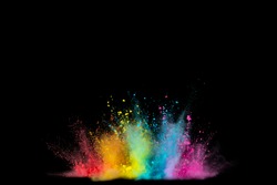 Explosion of colored powder isolated on black background. Abstract colored background