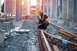 engineer sitting on railway inspection. construction worker on railways. Engineer work on railway.rail,engineer,Infrastructure