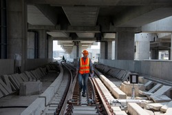 engineer walking on railway inspection. construction worker on railways. Engineer work on railway.rail,engineer,Infrastructure