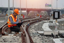 engineer Sitting on railway inspection. construction worker on railways. Engineer work on railway. rail, engineer, Infrastructure
