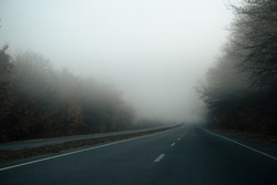 highway without cars. morning fog on the road. foggy autumn morning