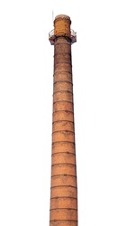 A large old industrial chimney made of red brick isolated on a white background