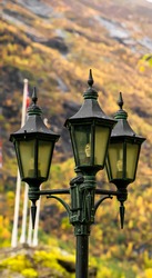 Traditional vintage lamp post made from black cast iron.