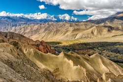 Nepal - Upper Mustang - 
View on Himalayian mountains en route from Dhakmar to Lo Gekar