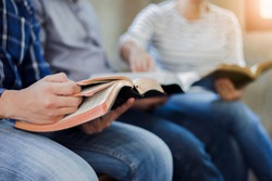 close up of christian group are reading and study bible together in Sunday school class room