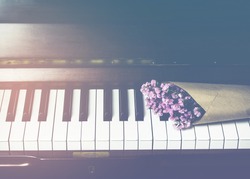 flower on piano keys, vintage color, can be use for music background