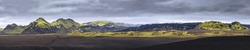 katla region Iceland, wide panorama of glacier and green mossy mountains