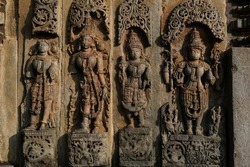 Beautiful Stone Sculpture with selective focus, 12th century Hindu temple, Ancient stone art and sculptures in each pillars, Chennakeshava Temple, Belur, Karnataka, India.