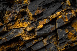 black rock background with gold  / yellow colored rocks -
