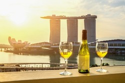 Drink wine on the balcony.Marina Bay View.romantic dinner.