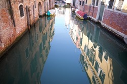 House reflection in the water. The photo was taken in Venice Italy.