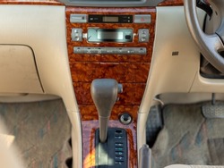 Dark wood trim interior of a japaneses car