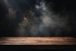 On a black background, an empty wooden table with smoke floats up. Empty space for displaying your products, with a smoke float up on a dark background. Space available for displaying your products.